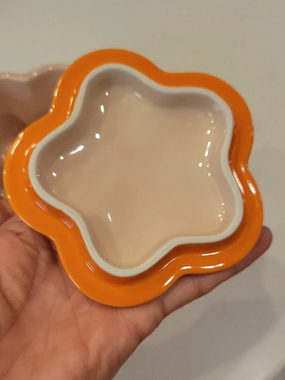 Le Creuset Flower-Shaped Stoneware Cocotte in Flame Orange